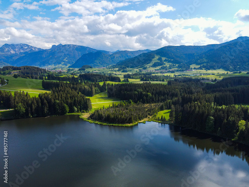 Fototapeta Naklejka Na Ścianę i Meble -  Typical Bavarian landscape in the German Alps - Allgau district - aerial view