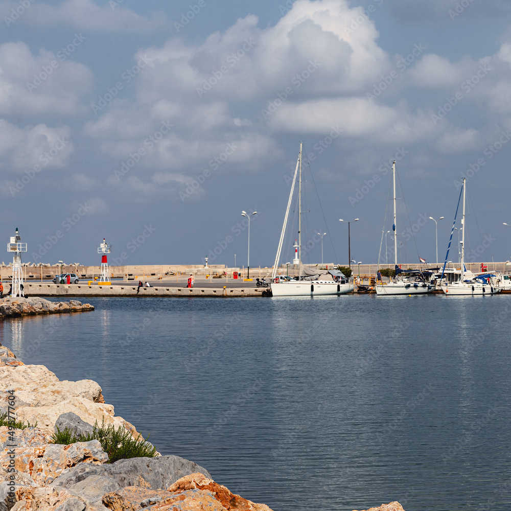 small sailing boats are parked in the seaport of a Greek town Rethymnon small sailing boats are parked in the seaport of a Greek town Rethymnon