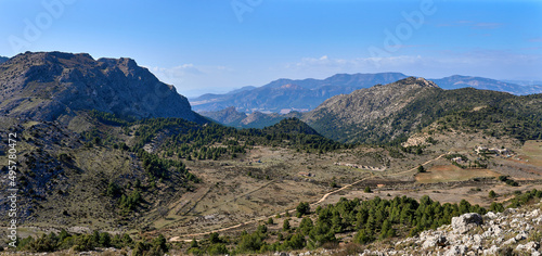 Sierra Espuña Natural Park. Sierra Espuña is a mountainous massif with a dense forest mainly of pine trees, with an abundant flora and fauna located in the Region of Murcia, Spain