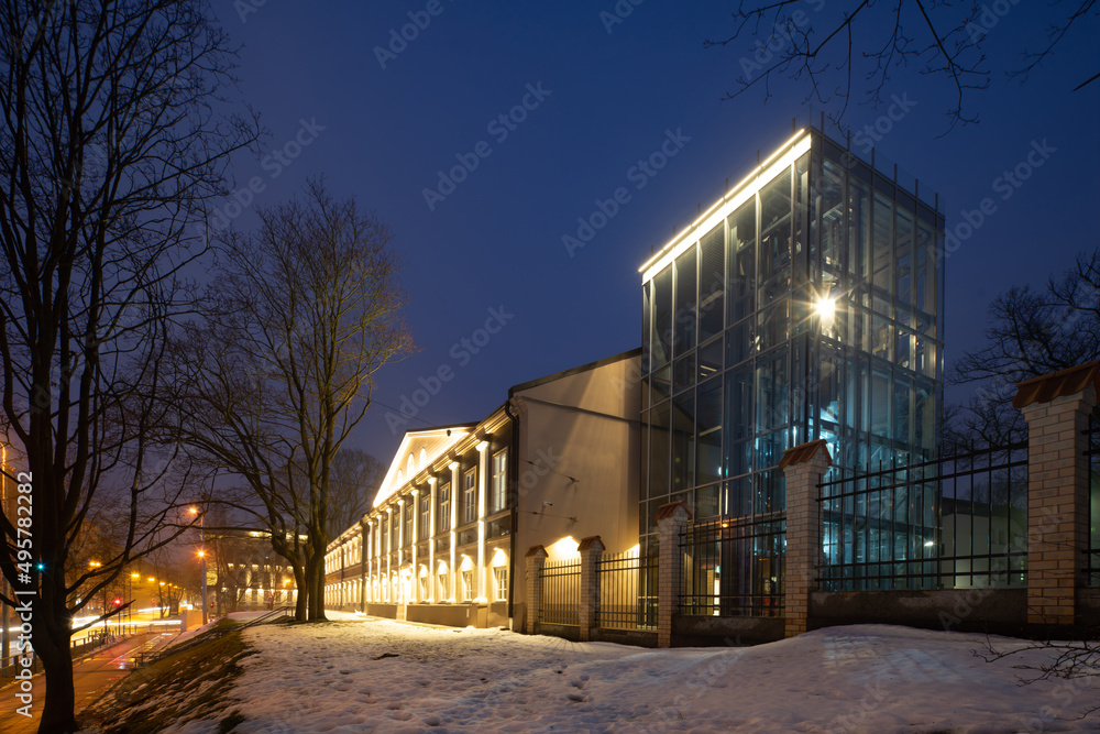 Exterior of illuminated modern building. City architecture.