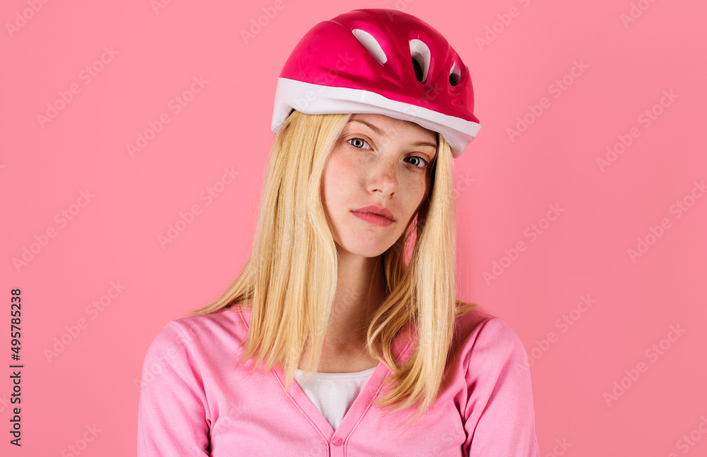 Sport lifestyle. Beautiful woman in cyclist helmet. Blonde girl in biking protective helmet. Sport lifestyle. Beautiful woman in cyclist helmet. Blonde girl in biking protective helmet.
