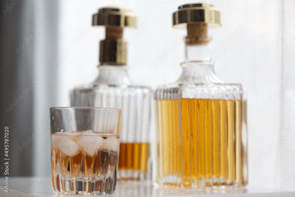 Luxury glass bottles with different alcoholic spirits inside, copy space photo Luxury glass bottles with different alcoholic spirits inside, copy space photo