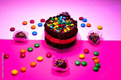 cake with candles and confetti