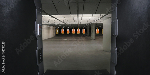 Interior of an empty shooting range with targets - sport photo