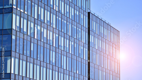 Wallpaper Mural Glass building with transparent facade of the building and blue sky. Structural glass wall reflecting blue sky. Abstract modern architecture fragment. Contemporary architectural background. Torontodigital.ca