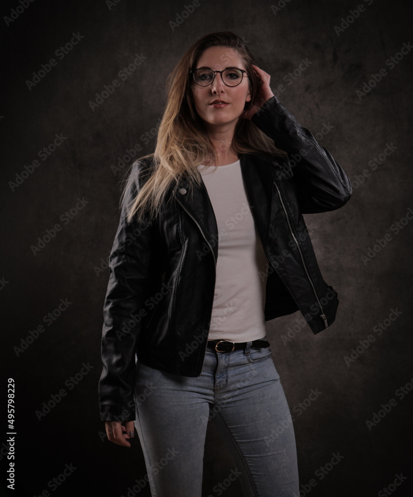 Close-up shot of a blonde beautiful woman in a studio - studio photography Close-up shot of a blonde beautiful woman in a studio - studio photography