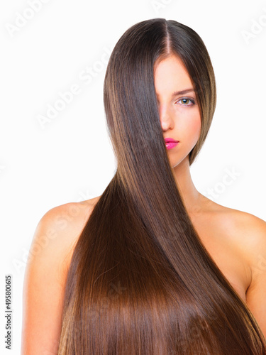 Amazing hair makes the best first impression. Studio portrait of a beautiful young woman posing against a white background.
