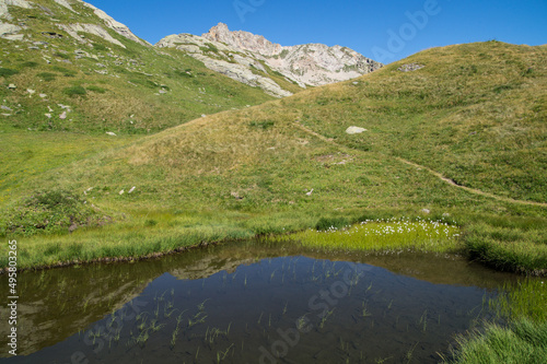 Tranquil landscape of lake verney in the mountains of Italy photo