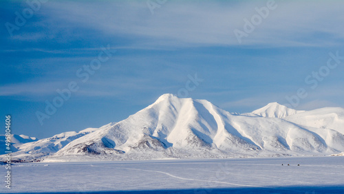 snowbikes leaving pyramiden in svalbard