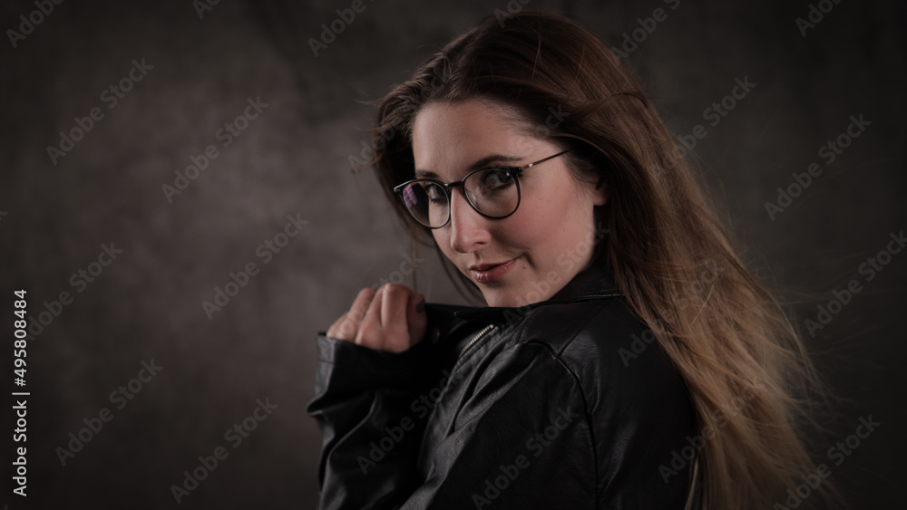 Photo shooting with a young attractive woman in a studio - studio photography Photo shooting with a young attractive woman in a studio - studio photography