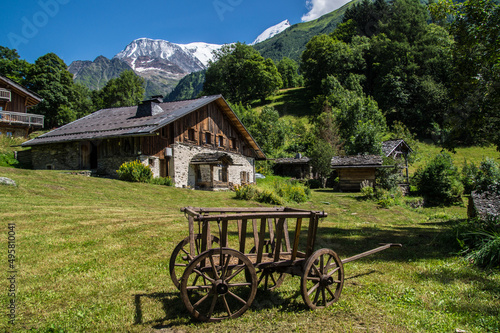 Serene landscape of rural houses on a mountain in Bionnassay, France photo