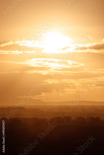 Serene landscape of a goldensunset in the field in Ireland photo