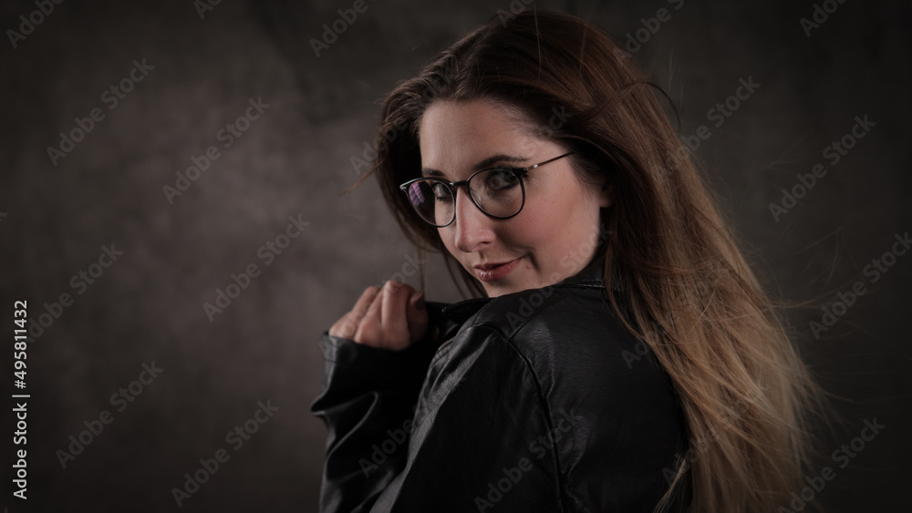 Close-up shot of a young attractive woman in her mid 20s - studio photography Close-up shot of a young attractive woman in her mid 20s - studio photography