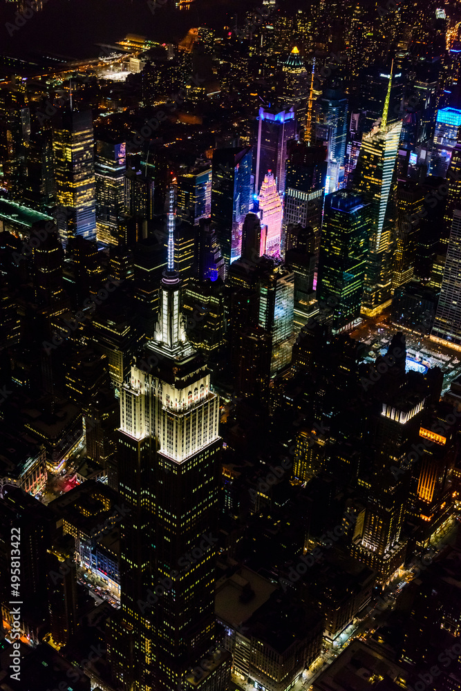 The city of New York City, Manhattan, aerial view at night. The city of New York City, Manhattan, aerial view at night.
