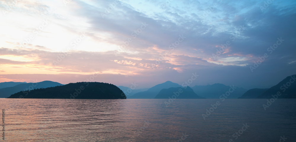 Dawn sky over peaceful Howe Sound, off West Vancouver. Dawn sky over peaceful Howe Sound, off West Vancouver.