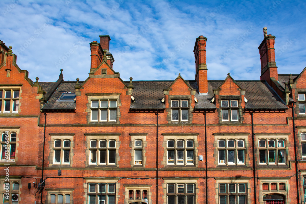 Fototapeta premium The Old Courts, Wigan town center, with blue skys behind. Built in the 1880's this building is grade II listed for its historical importance. Wigan, England.