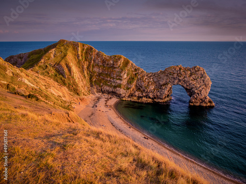 Famous Durdle Door in England at sunset - travel photography