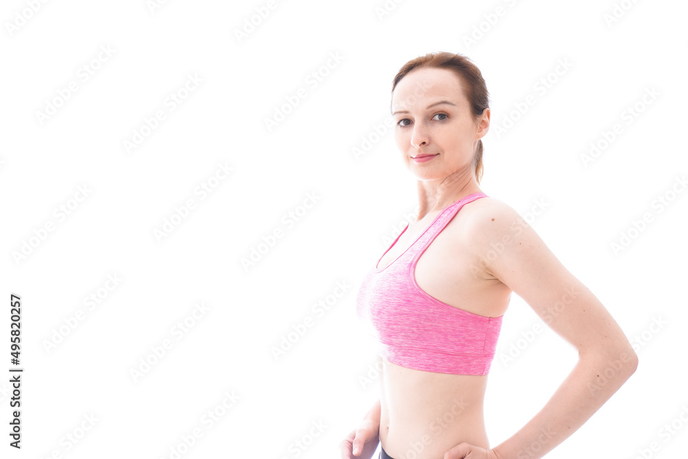 ダイエットをするスポーツウェアを着た若い女性 ダイエットをするスポーツウェアを着た若い女性