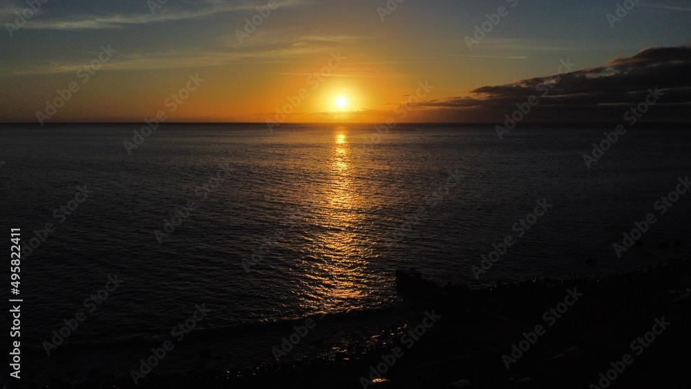 Naklejka premium Atardever with the sea 