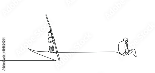 A villager family is out in a canoe to go fishing. little boy uses paddle to propel canoe boat