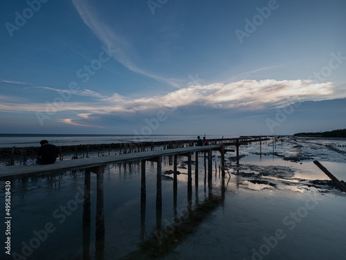 Take a photo on twilight time at Red Boardwalk Bridge Samut Sakhon province Thailand..