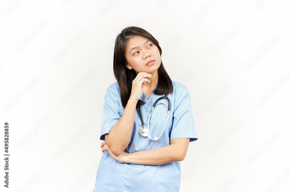 Thinking and Curious Of Asian Young Doctor Isolated On White Background Thinking and Curious Of Asian Young Doctor Isolated On White Background