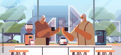 senior couple drinking coffee and talking together at home kitchen horizontal