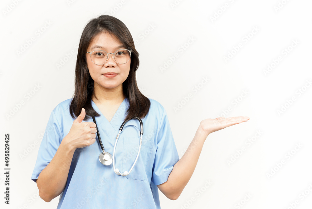 Showing and Presenting Product on Open Palm Of Asian Young Doctor Isolated On White Background Showing and Presenting Product on Open Palm Of Asian Young Doctor Isolated On White Background
