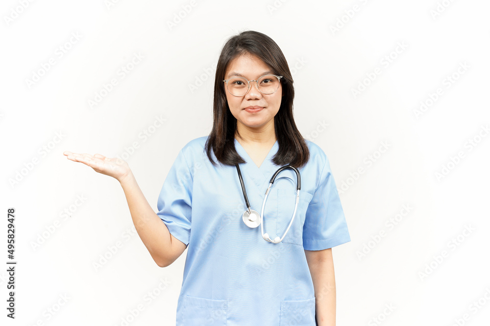 Showing and Presenting Product on Open Palm Of Asian Young Doctor Isolated On White Background Showing and Presenting Product on Open Palm Of Asian Young Doctor Isolated On White Background