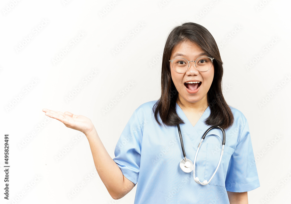 Showing and Presenting Product on Open Palm Of Asian Young Doctor Isolated On White Background Showing and Presenting Product on Open Palm Of Asian Young Doctor Isolated On White Background