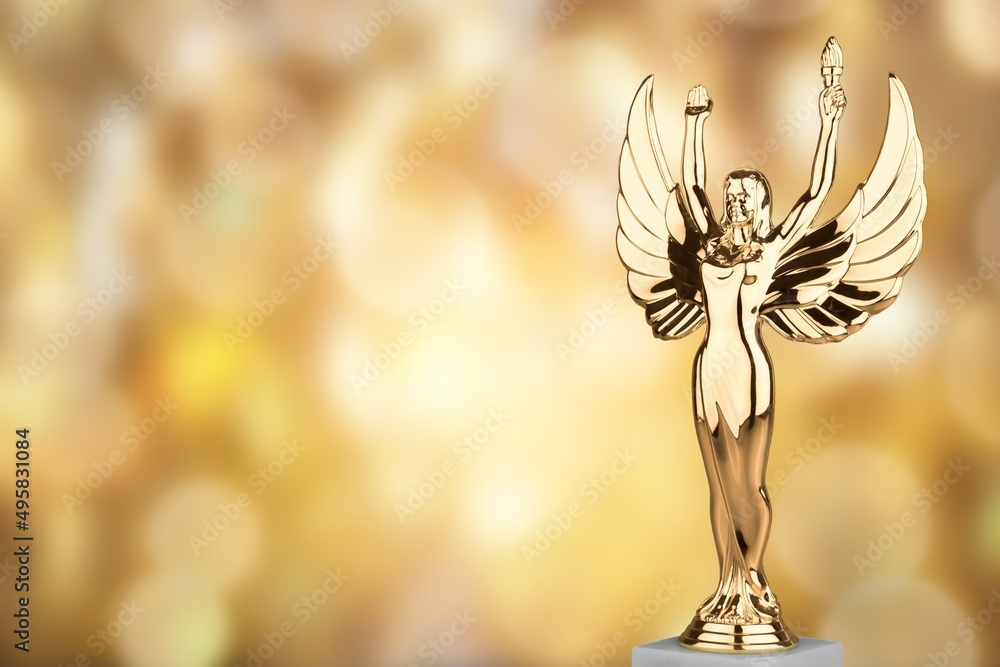 Hollywood Golden Academy award statue on fireworks background. Success