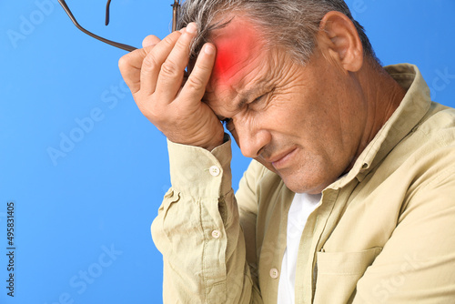 Mature man suffering from h...