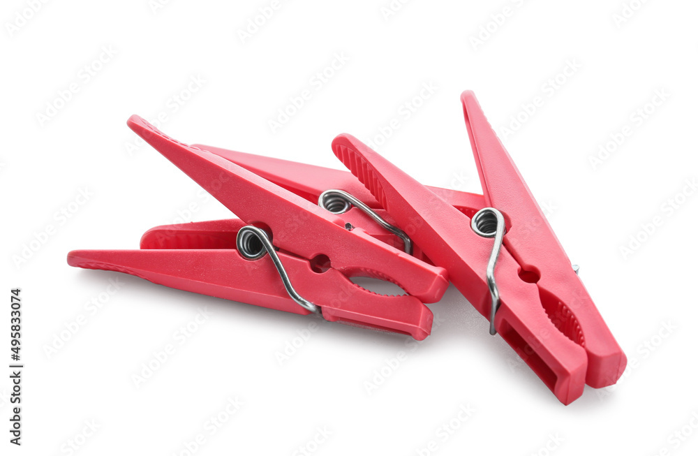 Plastic clothes pins on white background Plastic clothes pins on white background