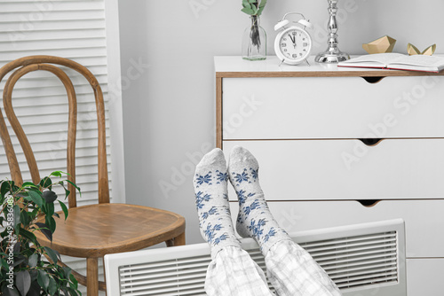 Woman in soft socks warming...