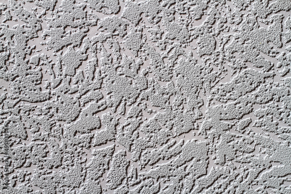 Abstract background texture of the wall with a relief coating. Abstract background texture of the wall with a relief coating.