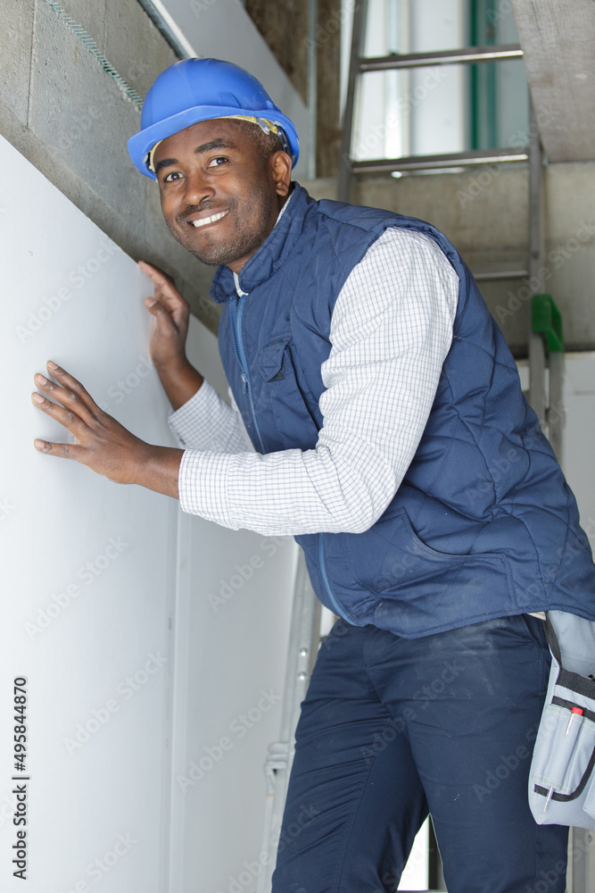 plasterer working on wall plasterer working on wall