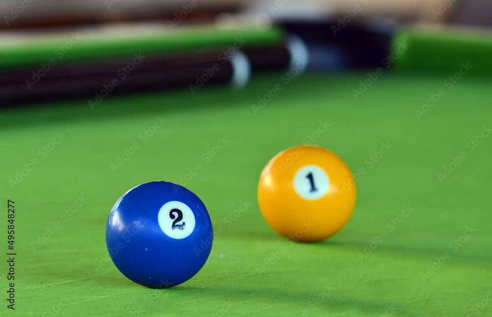 billiard balls on the table - Pool balls on green table billiard balls on the table - Pool balls on green table