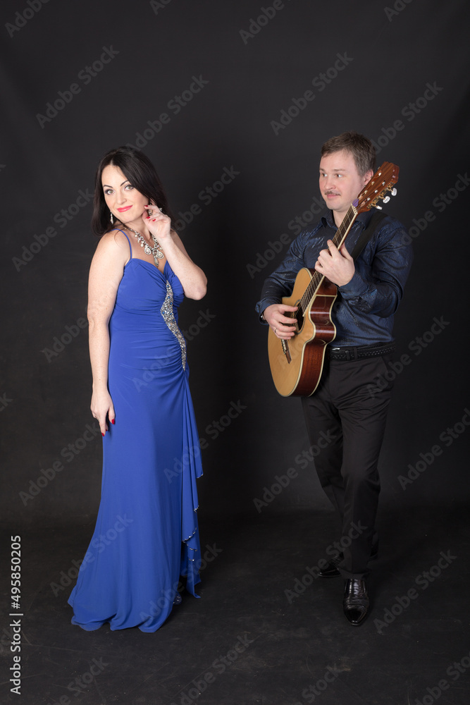 Fototapeta premium duet of singer and guitarist