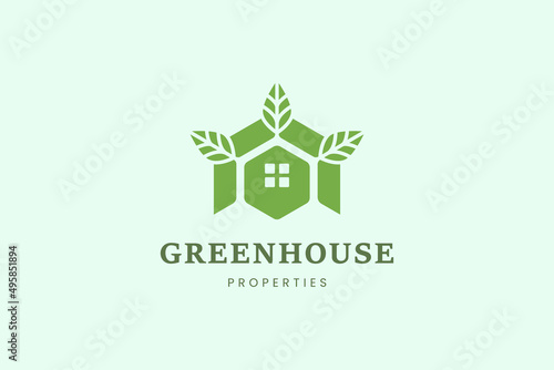 Home and leaf tree logo template for villa or hotel business
