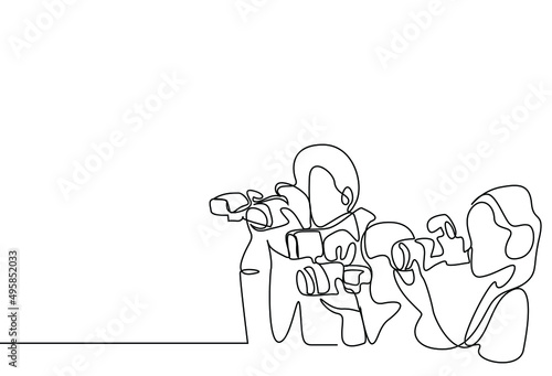 members of the press are recording with cameras