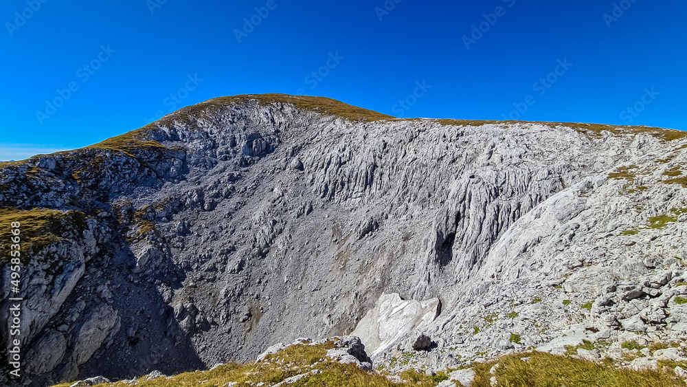 Panoramic view on the mountain peaks of the Hochschwab Region in Upper Styria, Austria. Soft hilly landscape of mount Karlstein in the Alps in Europe. Climbing tourism, wilderness. Concept freedom