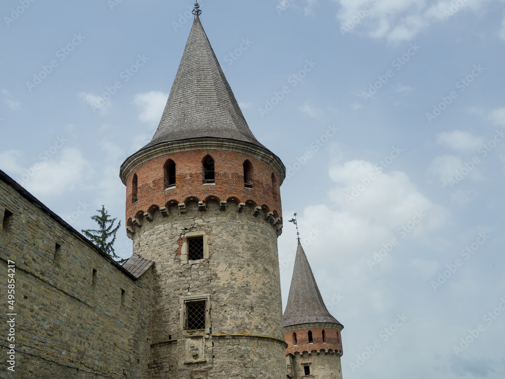 Kamianets Podilsky fortress on cloudy day in Khmelnytskyi Region, Ukraine. Lanckoronska Tower or the second Laska Tower, built between the 14th and 16th centuries