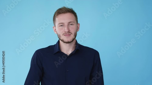 Self love. Support care. High esteem. Boomerang animation. Embracing peaceful relaxed man isolated on blue free space background GIF loop motion.