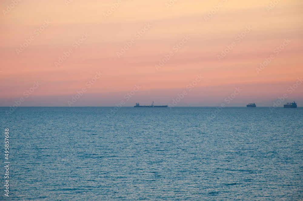 sunrise morning sky and sea with boat on horizon, summer sunrise morning sky and sea with boat on horizon, summer