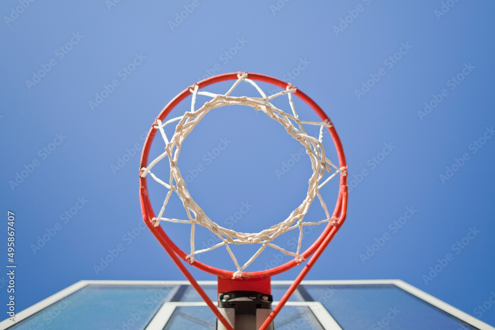 Basketball hoop, metal ring and netting, view from underneath. Basketball hoop, metal ring and netting, view from underneath.