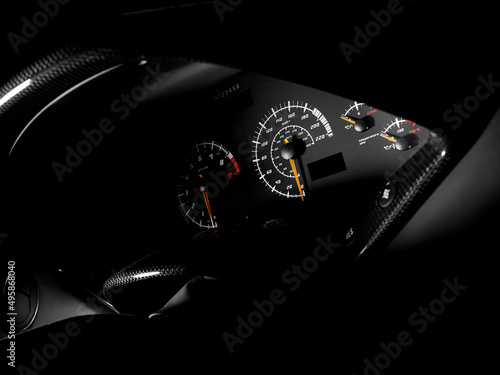 The dash,dashboard instruments and display,a speedometer,odometer of a sports car. photo