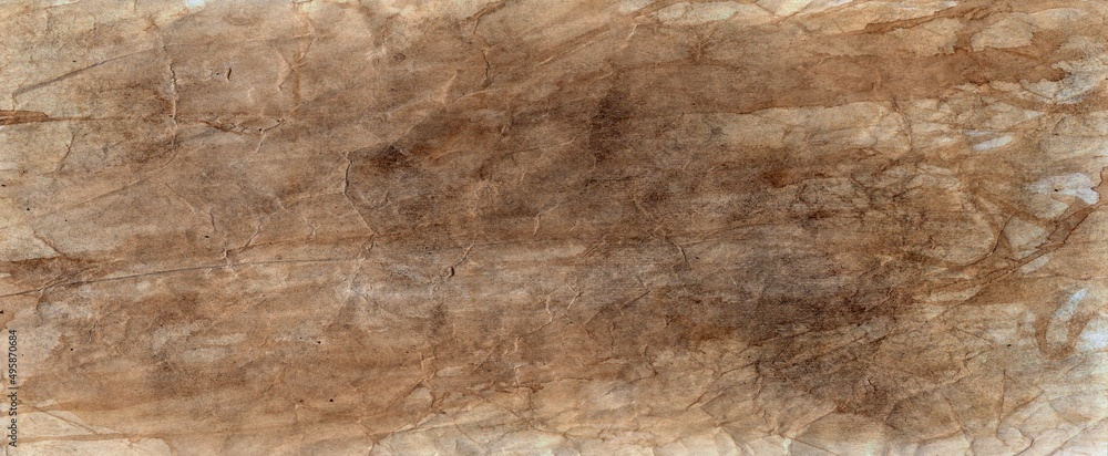 Old brown paper parchment background design with distressed vintage stains and ink spatter and white faded shabby center, elegant antique beige color Old brown paper parchment background design with distressed vintage stains and ink spatter and white faded shabby center, elegant antique beige color
