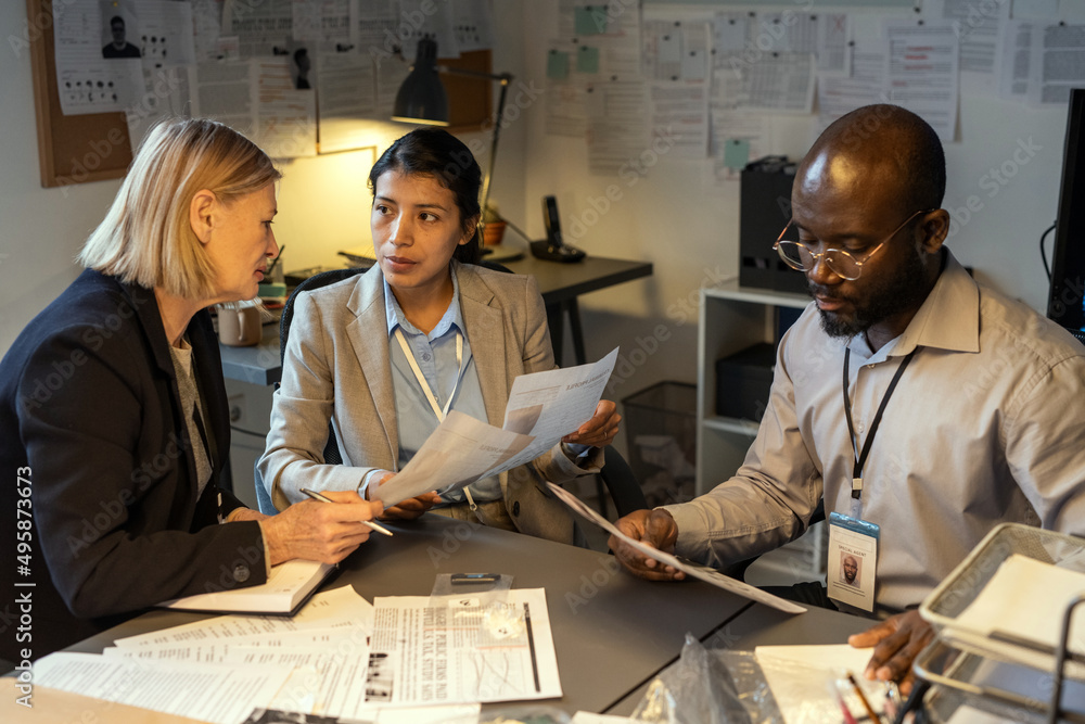 Fbi Interview Setting Intercultural agents of FBI discussing information of main suspects in ...