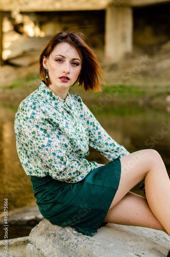 Sexy brunette woman posing in fashionable lingerie in jungle