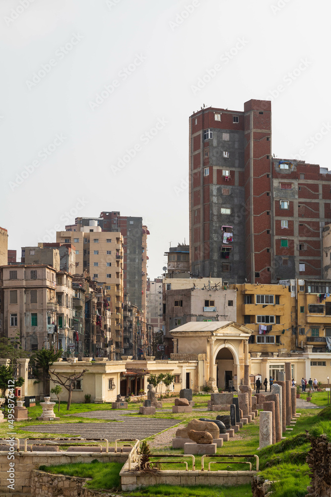 Fototapeta premium Cityscape with Pompeys Pillar and Serapeum. This Roman triumphal column. Alexandria, Egypt